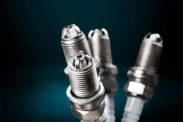 Can Bad Spark Plugs Cause My Engine to Stall in Summer?